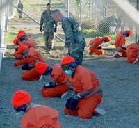 orange jumpsuited detainees