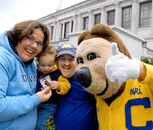 Oski and a family on Cal Day