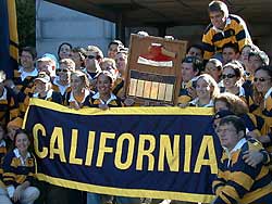 Rally Committee members pose for photos in front of the Campanile