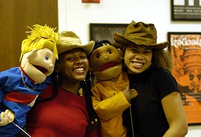 Willock and Johnson with puppets