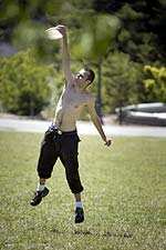 Student playing frisbee