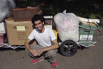 David Siddiqui and his bike trailer of reclaimed treasures