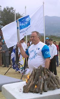 Valery Borzov with the Olympic torch in Nemea