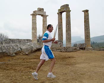 Olympig torch passes the Temple of Nemean Zeus