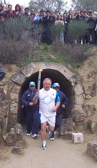 Olympic torch carried out of entrance tunnel