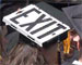 Exit sign on a mortarboard