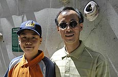 John Woo (right), with son Brian