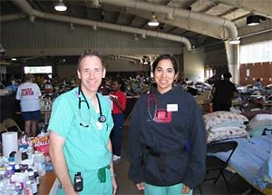 Dr. Ahmeen Ahmed with fellow doctor in evacuation shelter