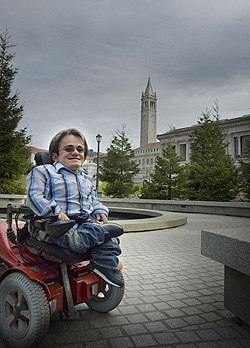Bryan Goodwin in his wheelchair beside the reflecting pool at Memorial Glade