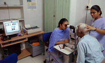 Patient undergoes eye exam