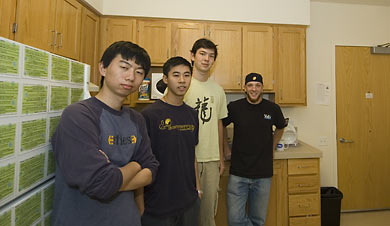 Green apartment residents in their kitchen