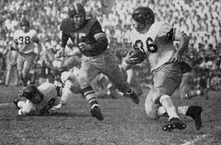 Bears running back  John Olszewski plays against USC in 1952