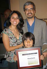  Alvara Huerta accepting Yamashita Prize, with wife, Antonia Montes, and son Joaquin