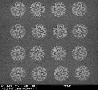 scanning electron image of a 4-by-4 array of plasmonic lenses