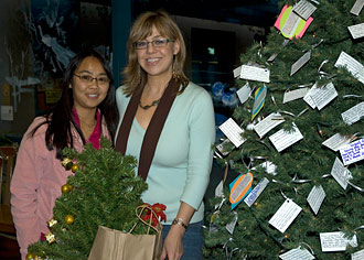 Tang Center staff with holiday collection