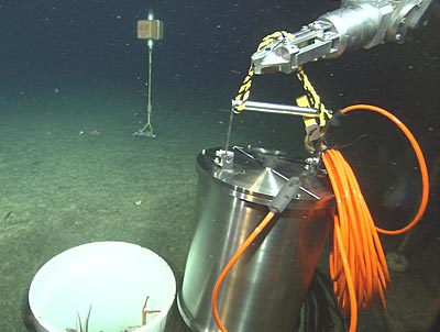 broadband seismometer being lowered to the ocean bottom
