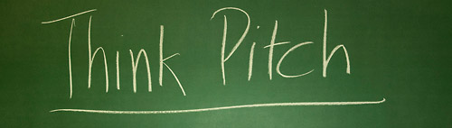 Blackboard writing: "Think Pitch"